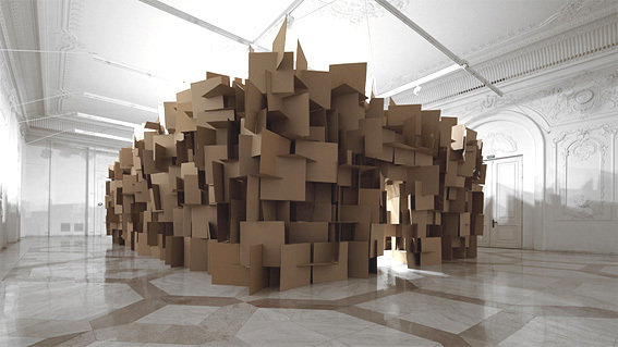 200 prepared dc-motors, 2000 cardboard elements 70x70cm Zimoun in collaboration with Architect Hannes Zweifel 2011